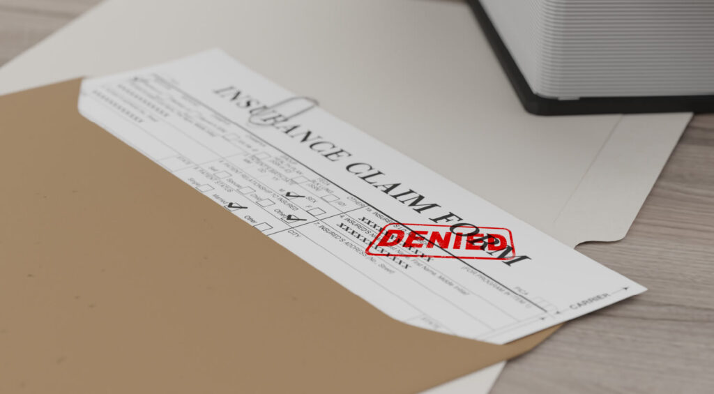 insurance claims with a denied stamp