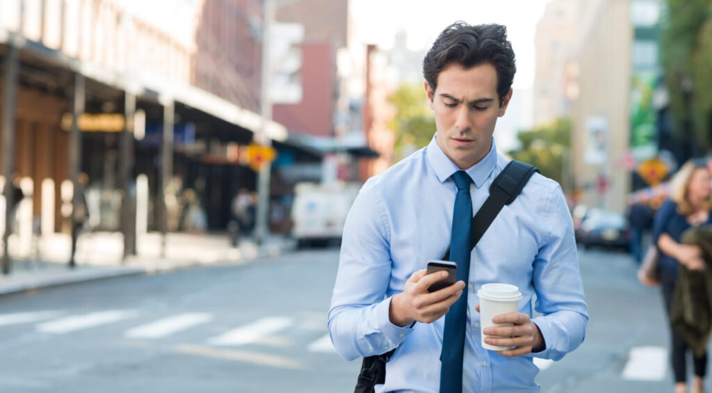 person getting a work call on their phone